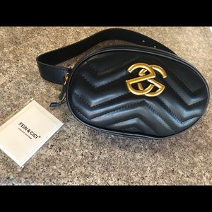 Leather fanny pack with gold symbol